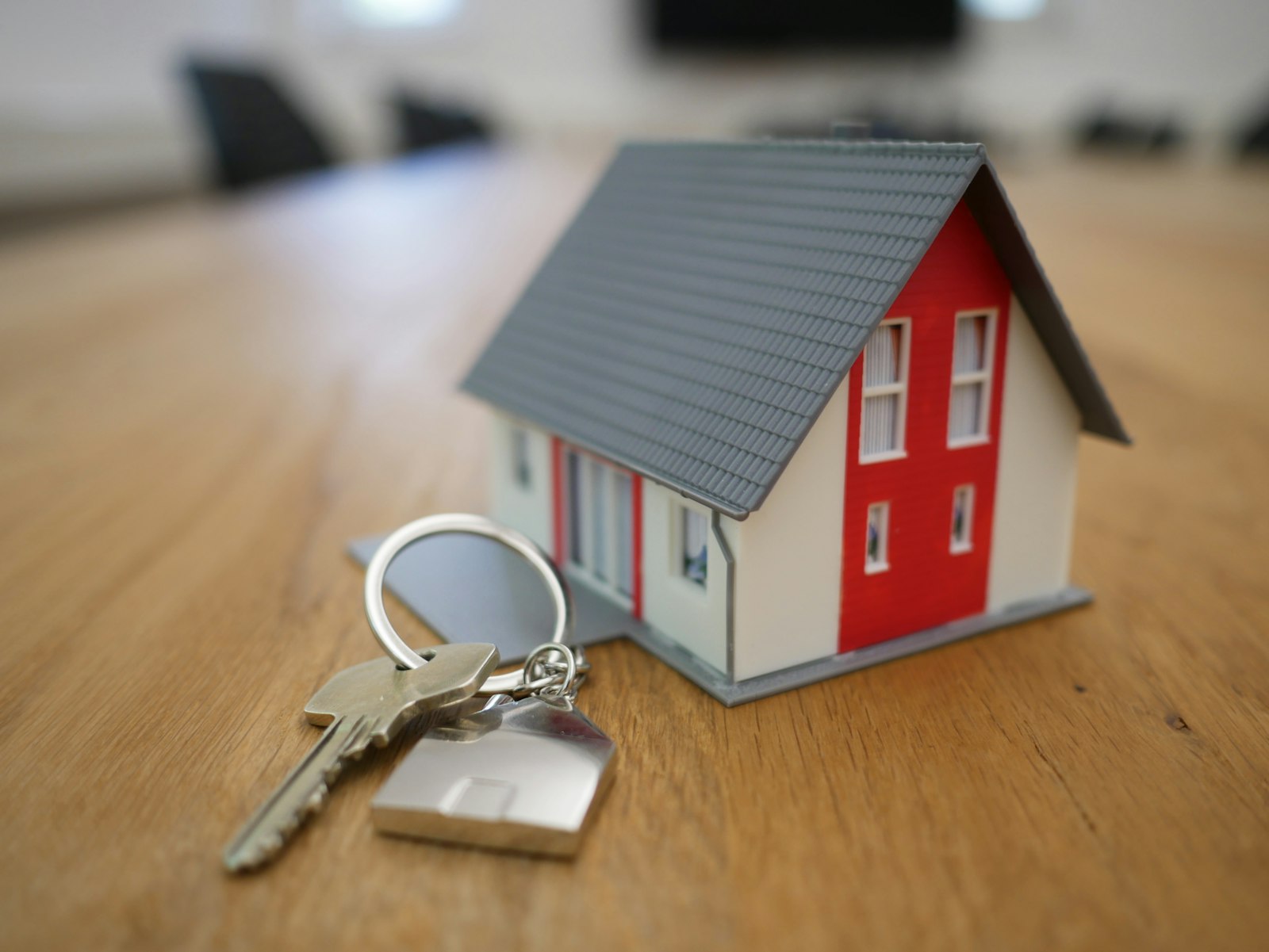 Homebuyers reviewing Level 2 and Level 3 survey options with surveyor